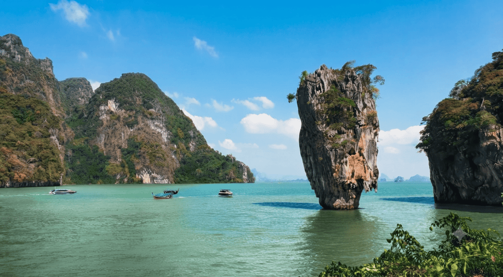 James Bond Island's iconic limestone rock formation rising from the water in Phang Nga Bay, Thailand